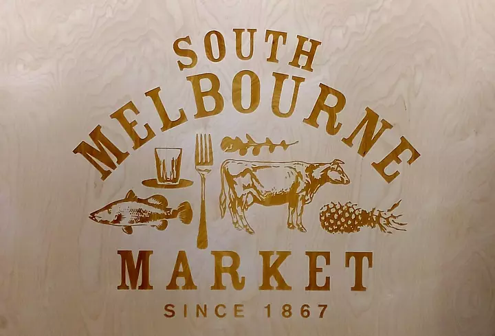 engraved wooden sign south melbourne market